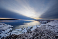Sunset View Between the Breakwater Walls